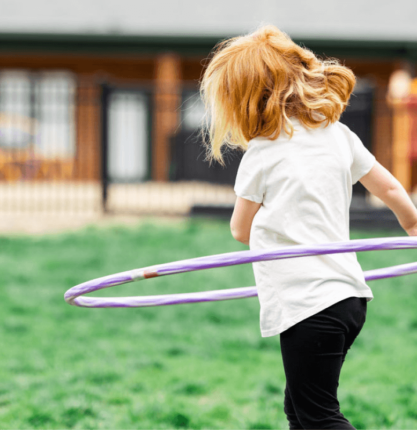 LeafSpring School student hula hooping outside